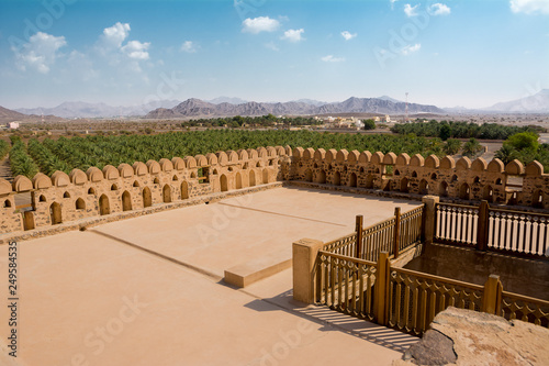 Terrace of the fort of Jabrin and in the background of Bahla and date crops
