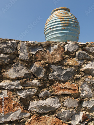 Wallpaper Mural Old jar on stone wall with sky background Torontodigital.ca