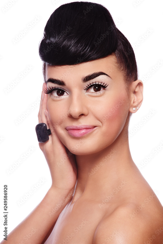 Portrait of young beautiful woman with stylish make-up and fancy hairstyle Portrait of young beautiful woman with stylish make-up and fancy hairstyle