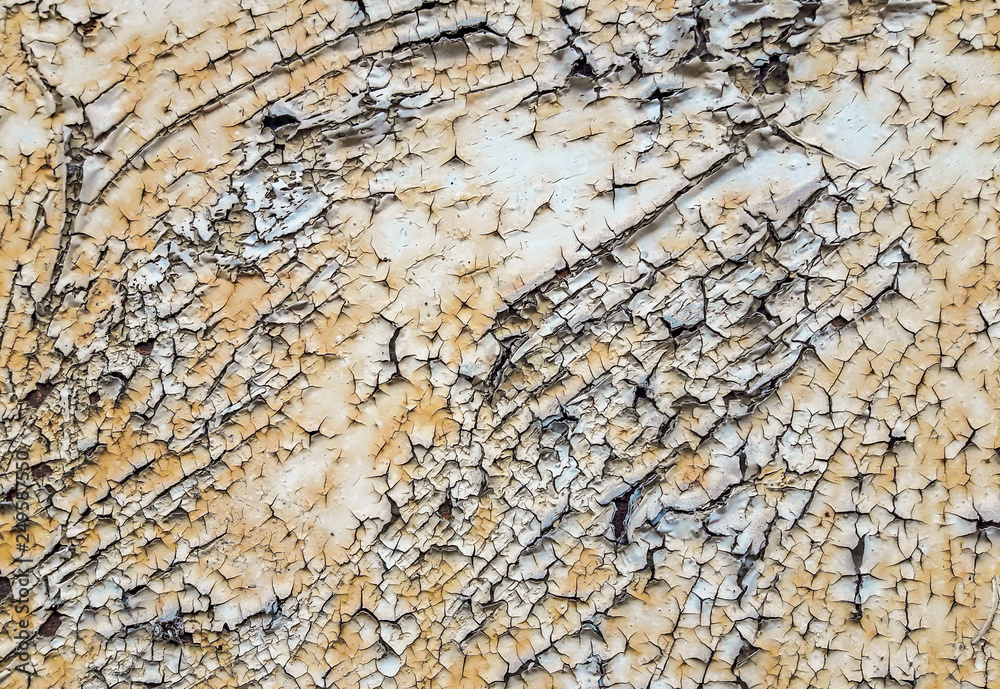 Texture of old damaged wood. Background of white cracked paint. Texture of old damaged wood. Background of white cracked paint.