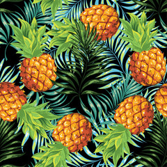 Keuken achterwand Ananas patronen Rijpe ananassen met palmtakken op zwart  © podtin