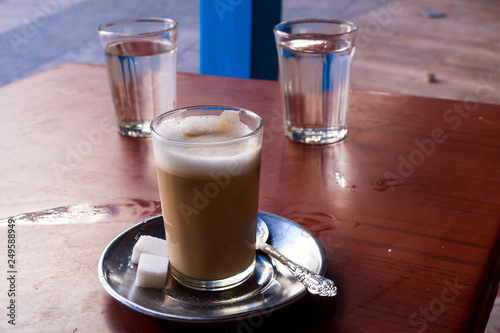 Coffee with milk in a street bar, Morocco
