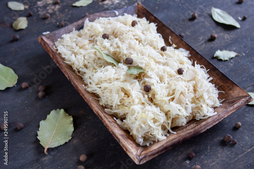 Pickled cabbage on a wooden tray