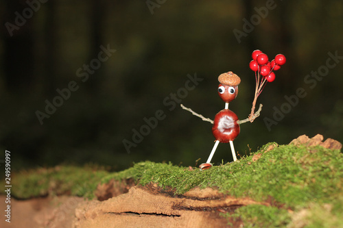 Crafted chestnut male with balloons