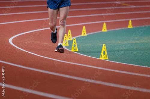 Sportsperson on track in race walk competition photo