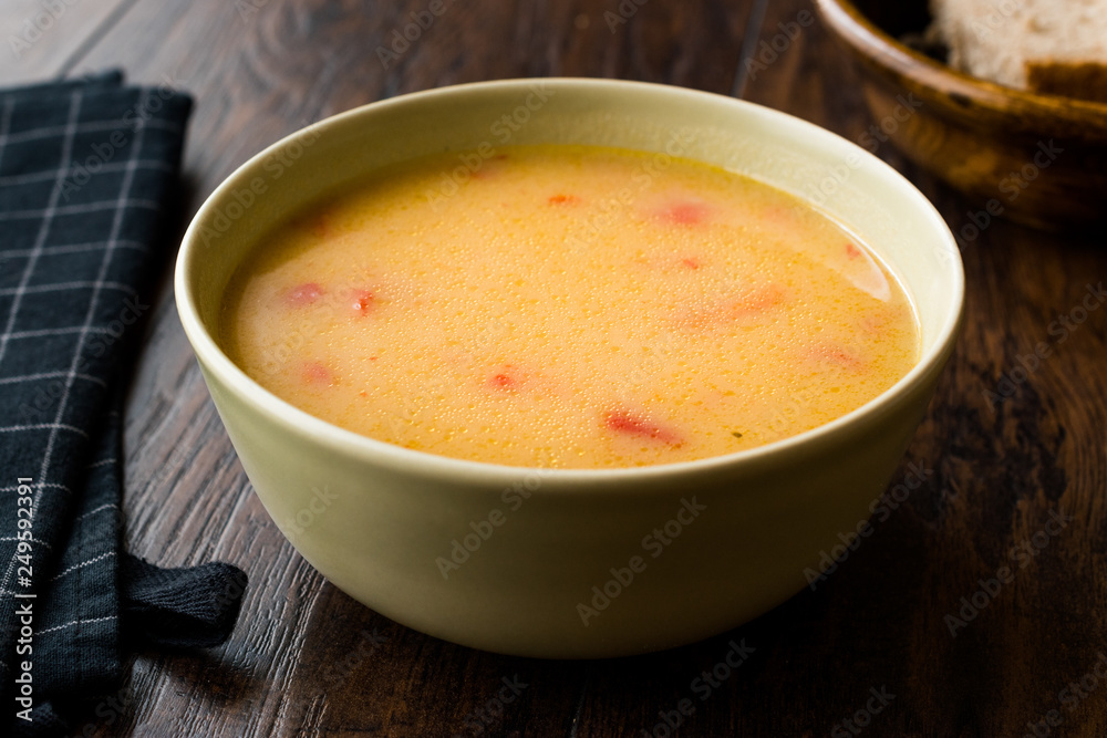 Homemade Potato Pumpkin Soup served with Bread.