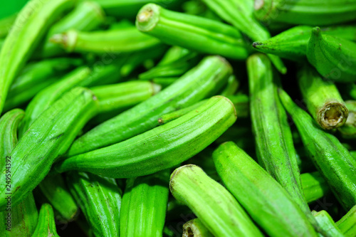 View of fresh green okra vegetable in bulk at a farmers market 
