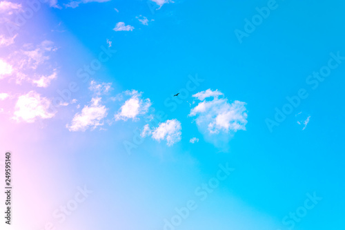 Beautiful Clouds against blue sky. Abstract Background. Blue sky with clouds and sun