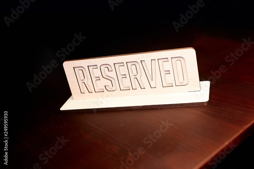 plate reserved on a table in a restaurant