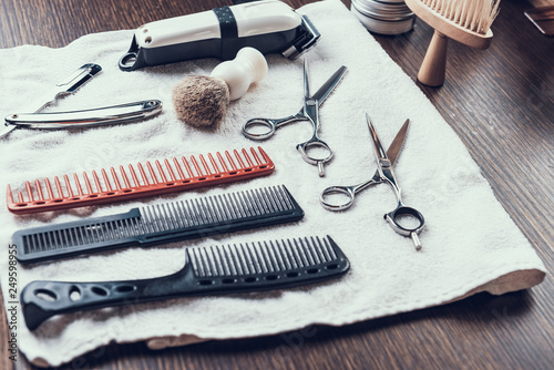 Photo of hair cutting tools lying on table