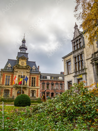 Wallpaper Mural View of Malmedy Town Hall in Belgium built in 1900 and part of Villa Lang to the right under a moody overcast November sky Torontodigital.ca