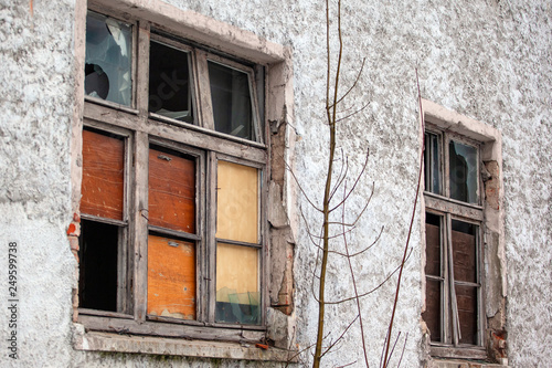 broken glass in the window of an abandoned house © Sergey