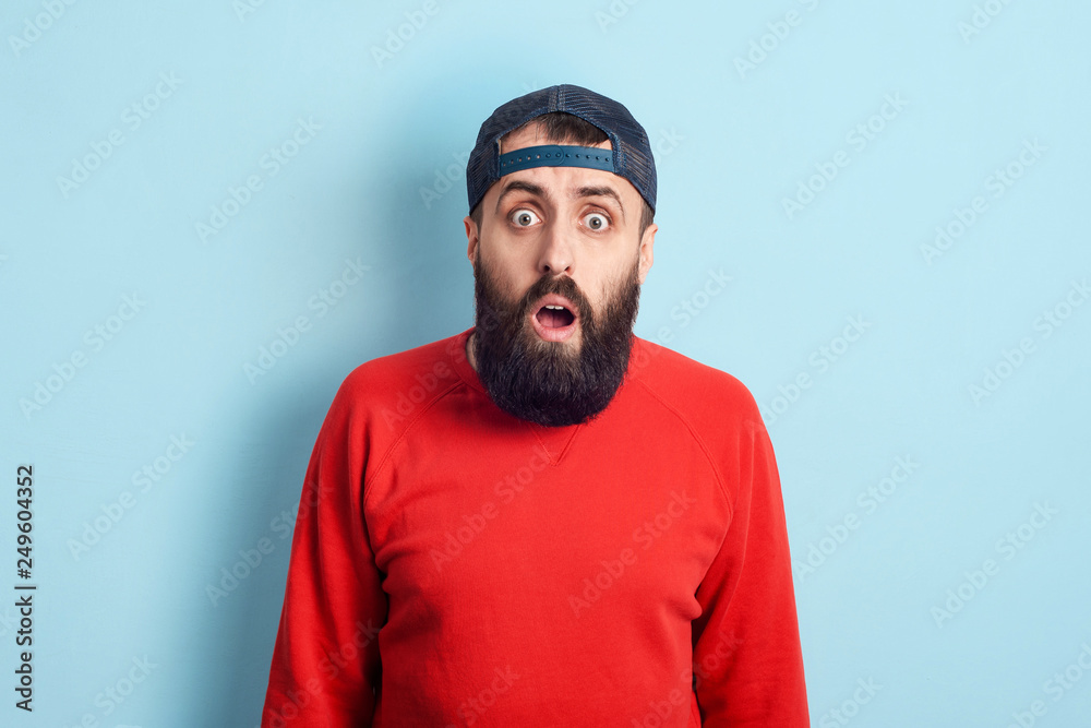 Bearded man with open mouth demonstrating shock emotions