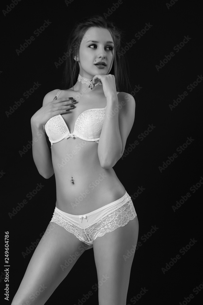 Naklejka premium young sexy girl in white lingerie