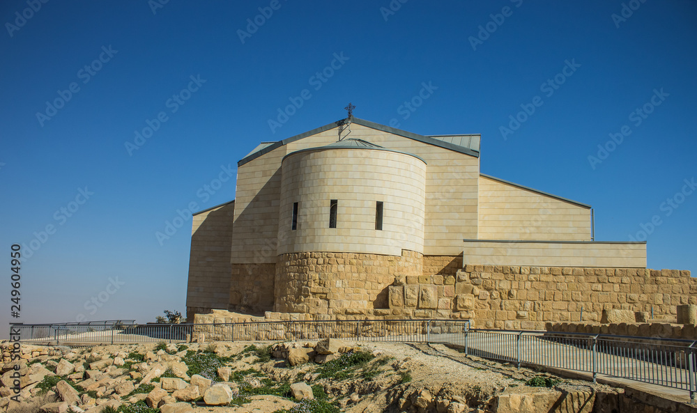 east Byzantine church ancient religion building facade in desert nature outdoor wilderness environment 