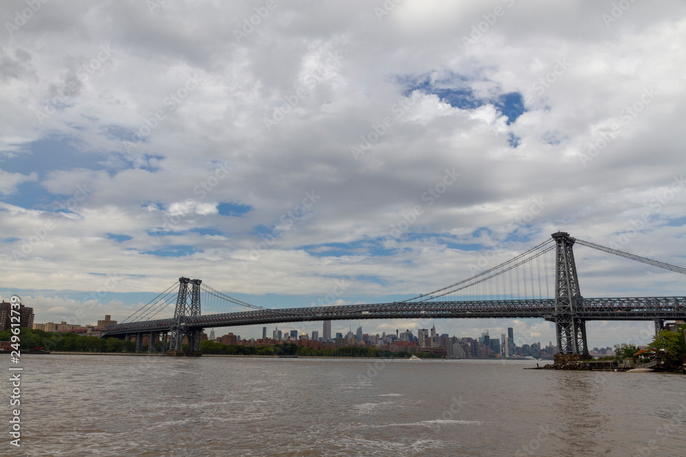 New York City - beautiful sky over manhattan with manhattan bridge