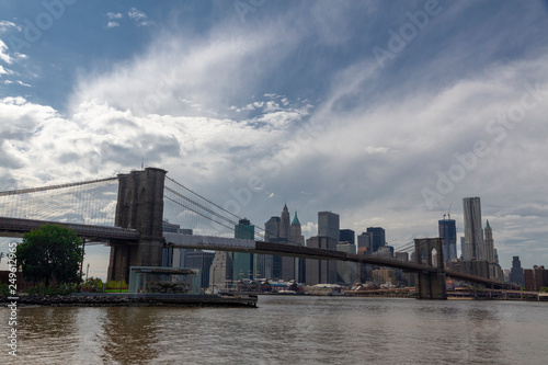 New York. View of Lower Manhattan and Brooklyn Bridge skyline on a sunny summer day