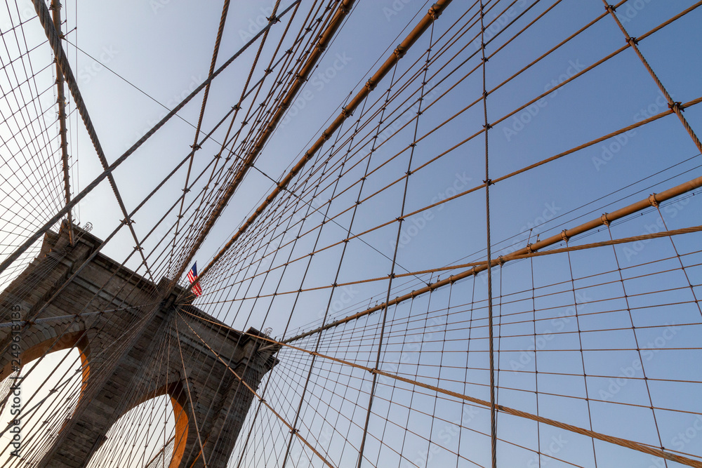 Naklejka premium Brooklyn Bridge in New York City at sunrise