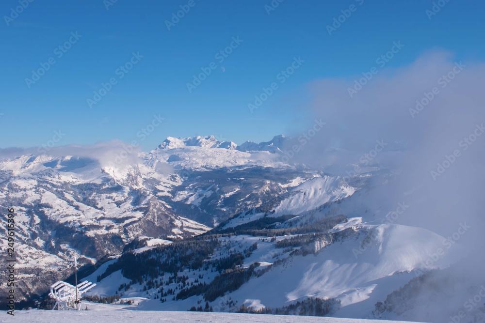 Beautiful panoramic view of snow-capped mountains in the Swiss Alps