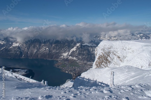 Swiss mountain peak after snowfall with panoramic view of Lake Lucerne (Vierwaldstattersee)