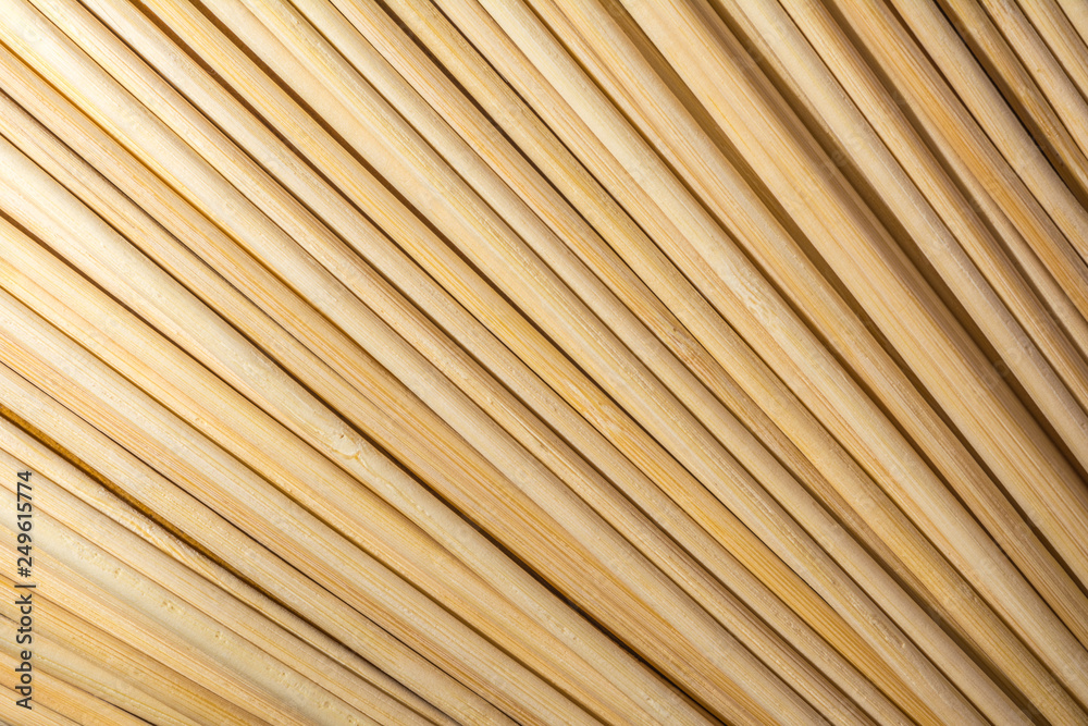 Round wooden sticks background. Close-up Wall Pattern Round wooden sticks background. Close-up Wall Pattern