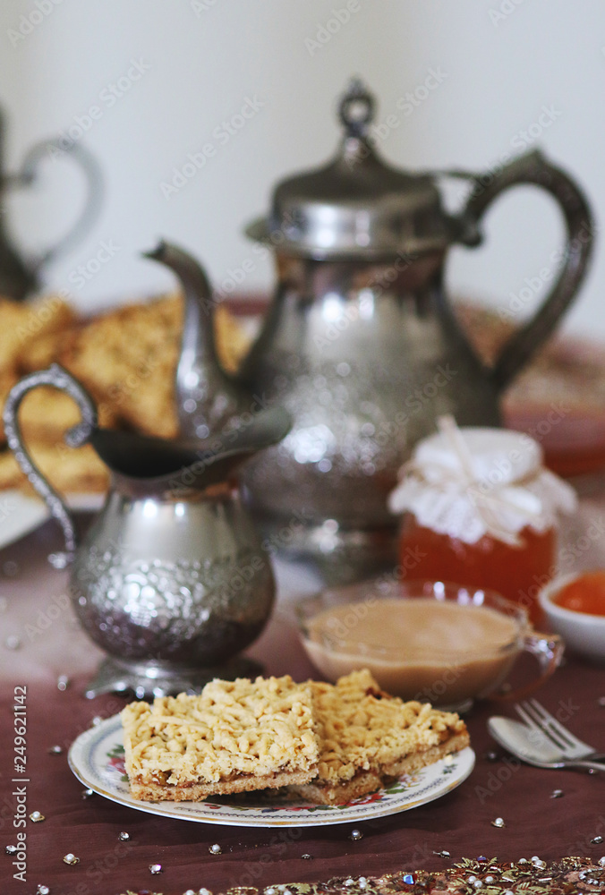 Grated pie served with coffee and jam Grated pie served with coffee and jam