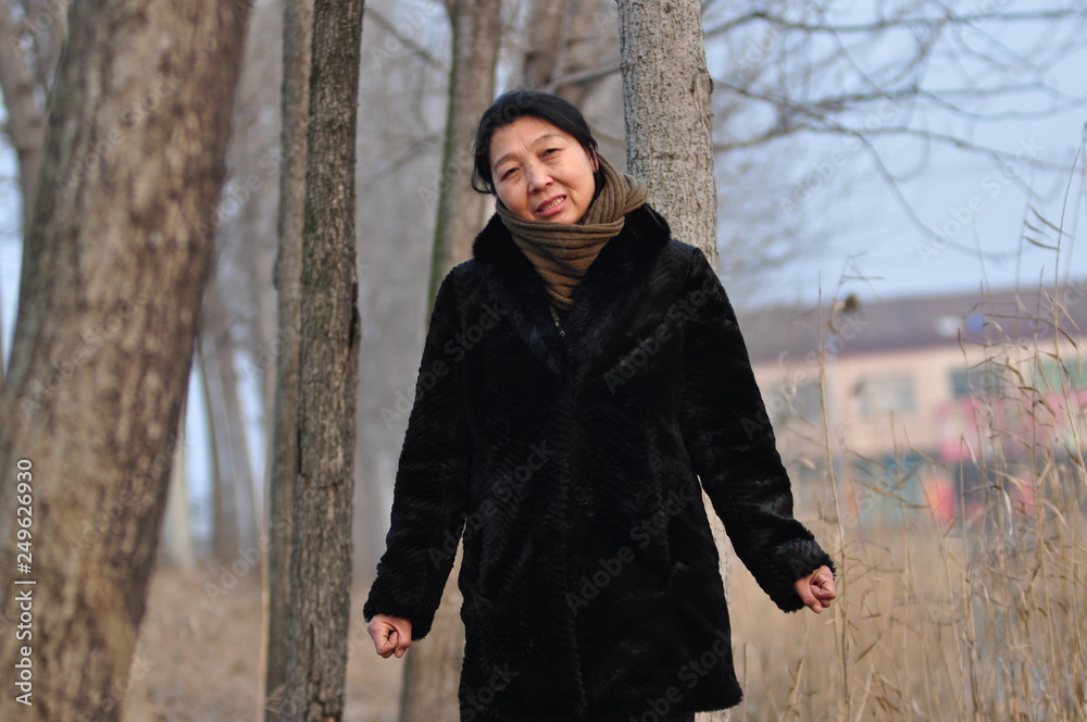 A middle-aged Asian woman A middle-aged Asian woman