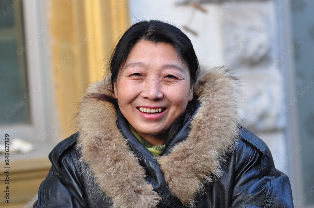 A middle-aged Asian woman