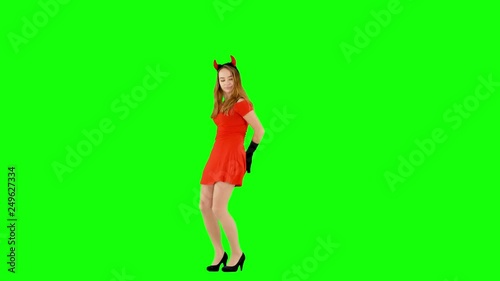 Attractive Teen in Devil costume Dancing Slowly on Green Screen
