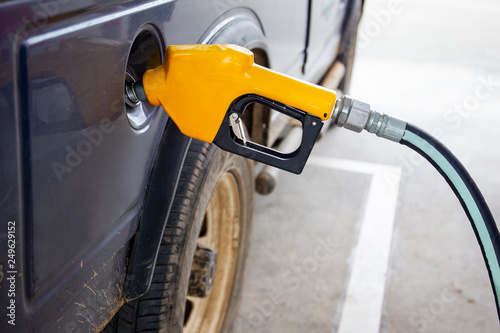 4 Wheel drive vehicle refueling a gas at gas station.