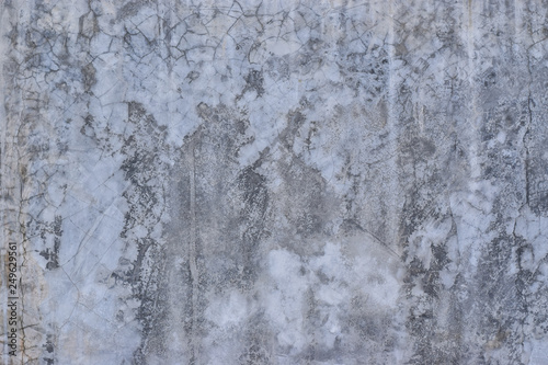 Grunge concrete wall with crack and stains in industrial building. Cement texture for design and background. © banphote