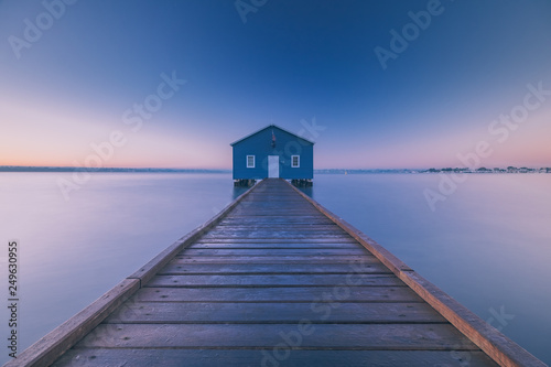 Blue boat house at sunrise in Perth