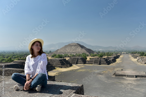 Young woman overlooking ancient ruins © Alice Nerr
