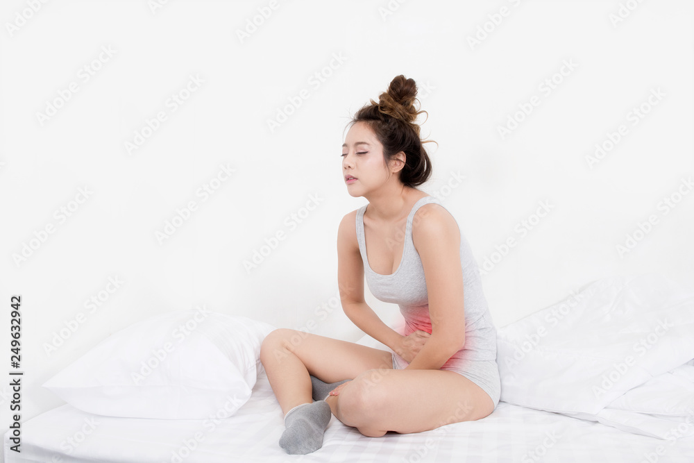 Pretty young woman Body aches in the bedroom Pretty young woman Body aches in the bedroom