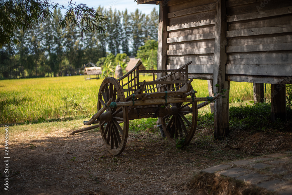 Old wooden wagons in the countryside. Thailand