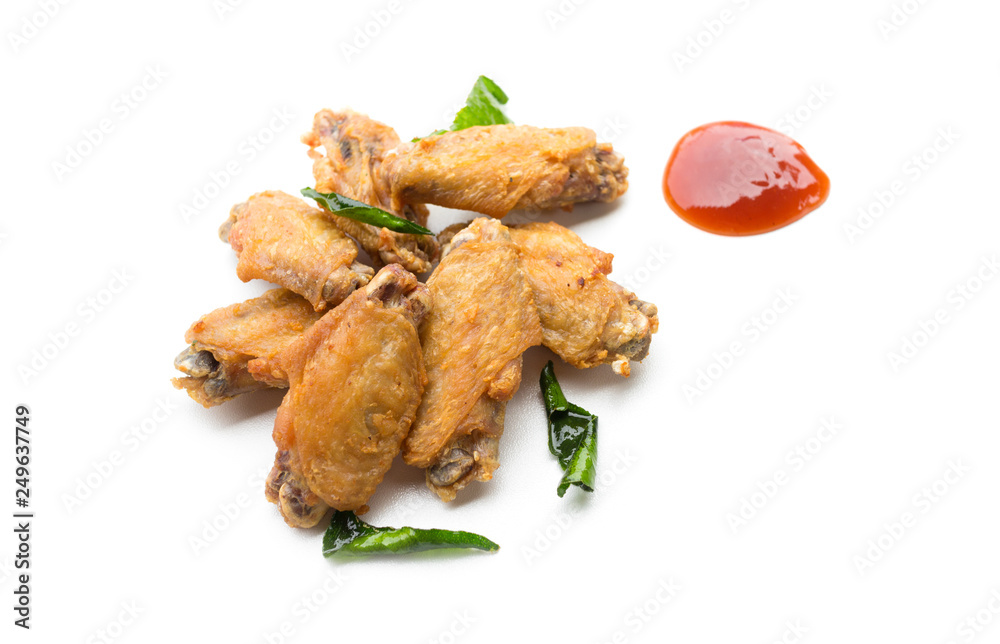 Fried chicken wings and ketchup isolated on white background Fried chicken wings and ketchup isolated on white background