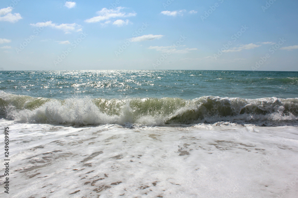 Blue sea under the bright sun, Lots of spray! Blue sea under the bright sun, Lots of spray!