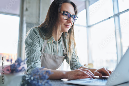 Woman in front of laptop