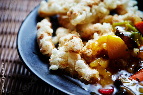 Sweet sour sauce with fried rice cake photo