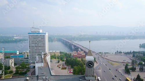 The city clock. Communal bridge, the city administration. Panorama of the city of Krasnoyarsk. Russia, From Drone photo