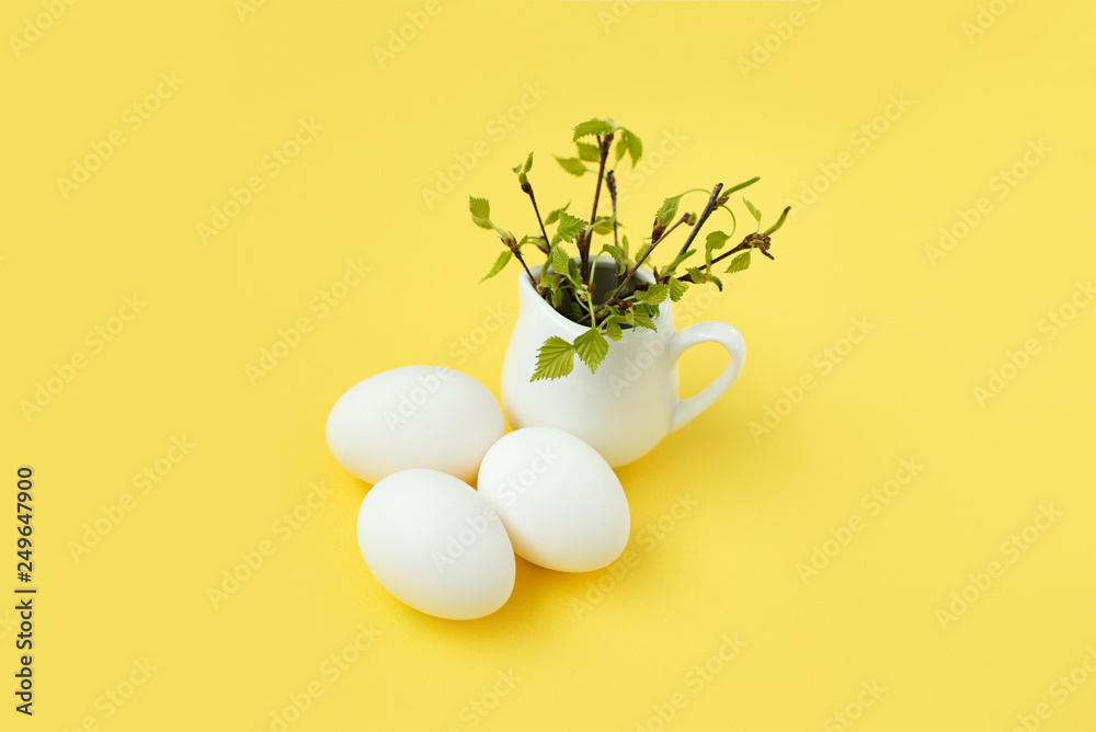 happy Easter eggs and branch yellow background happy Easter eggs and branch yellow background