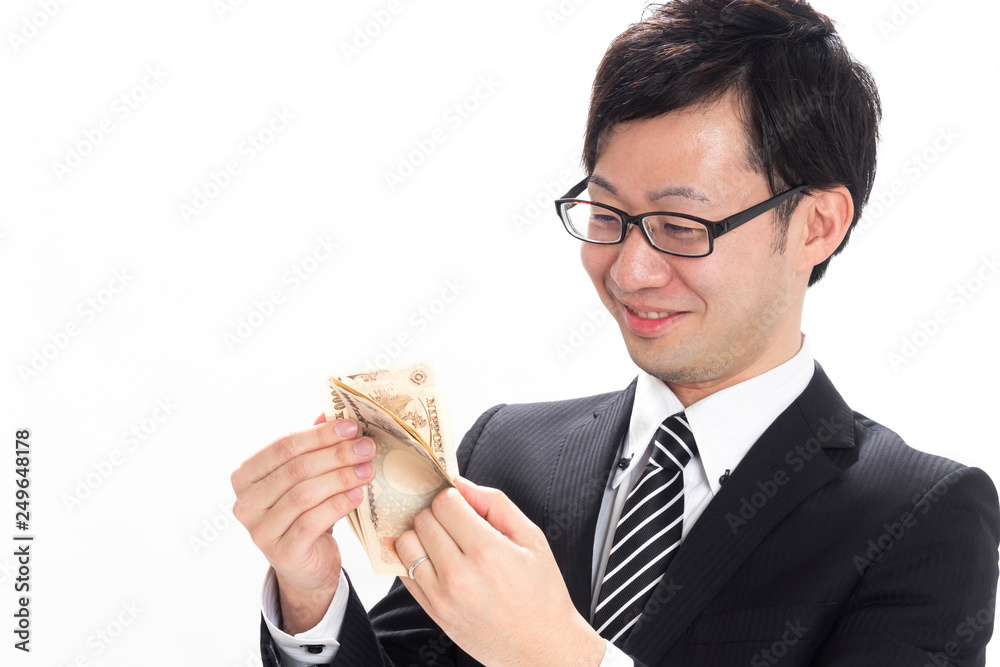 お金を数えるビジネスマン Stock Photo Adobe Stock