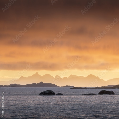 Coast of the of Norwegian fjords at sunset near Tromso Norway. Winter morning after sunrise. Lofoten Beautiful landscape above the arctic circle. 