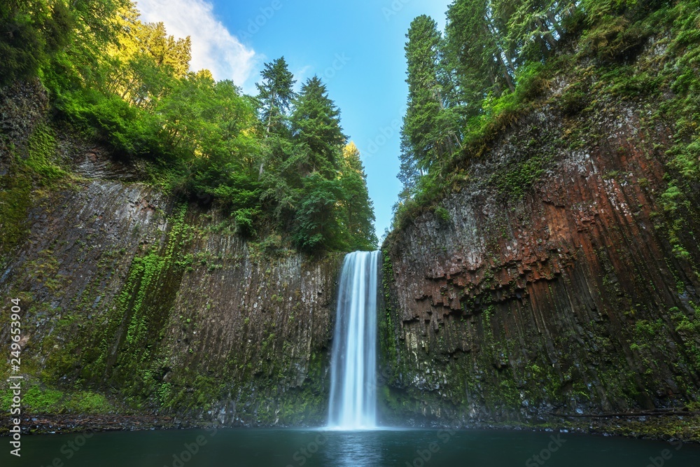 Beautiful waterfall of Abiqua Creek, Abiqua Falls. Located in Marion County, Oregon near Silverston. Abiqua Falls is one of the hidden gems in Oregon. Abigua falls flowing over the lava rock formation