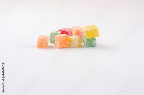 Colored cubes of rahat-lokum on a light background