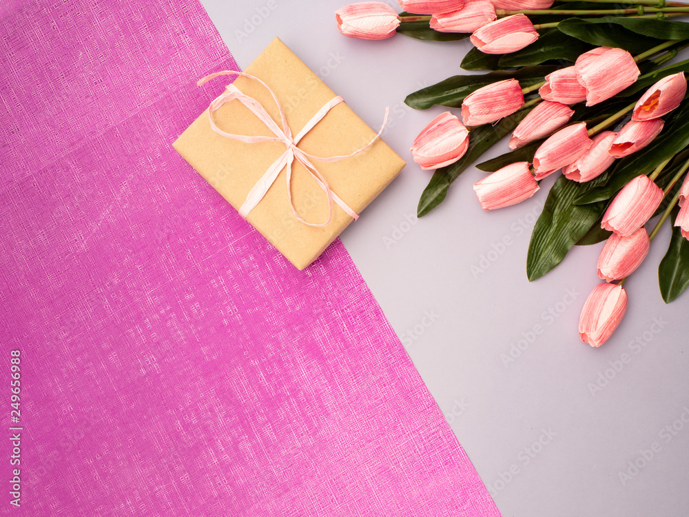 Purple tulip and gift box on Purple background Purple tulip and gift box on Purple background