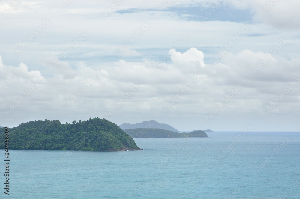 Turquoise sea and tropical islands on horizon near tropical Koh Chand island in Thailand Turquoise sea and tropical islands on horizon near tropical Koh Chand island in Thailand