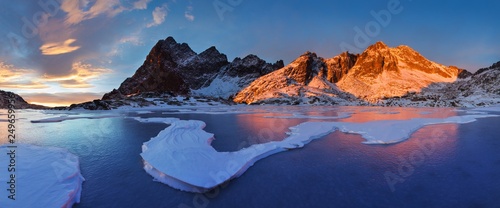 Fototapeta Naklejka Na Ścianę i Meble -  Winter landscape of High Tatra Mountains on Small cold valley after fresh snowfall. High Tatras, Slovakia Windy and cold weather Wonderful winter day in Europe Beautiful first snow in mountain concept