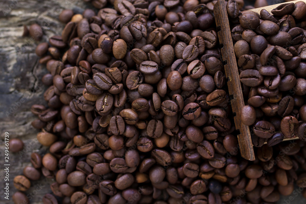 Fototapeta premium Roasted coffee beans. Food and drink background. Top view.