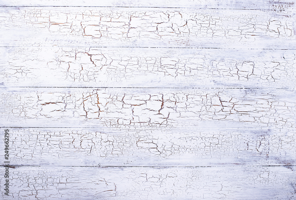 Old rustic crackle white wooden background